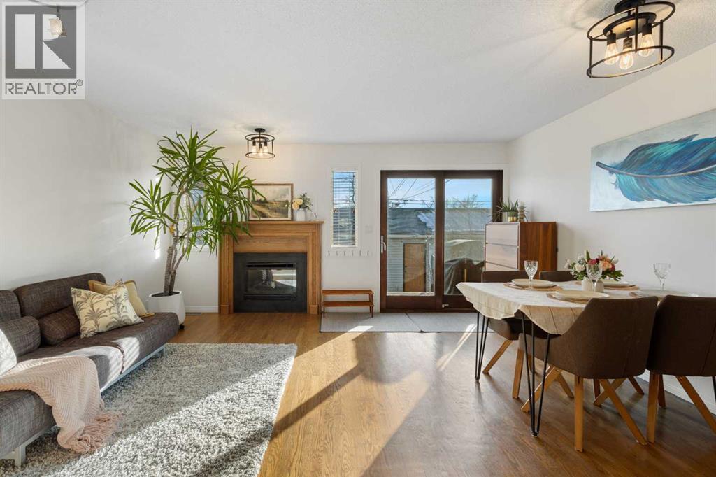 1629 29 Avenue Sw, Calgary, AB - Indoor Photo Showing Living Room With Fireplace