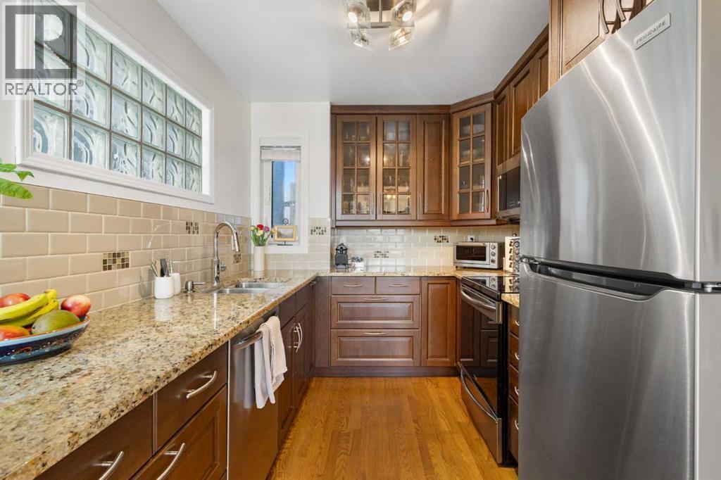 1629 29 Avenue Sw, Calgary, AB - Indoor Photo Showing Kitchen With Stainless Steel Kitchen With Double Sink