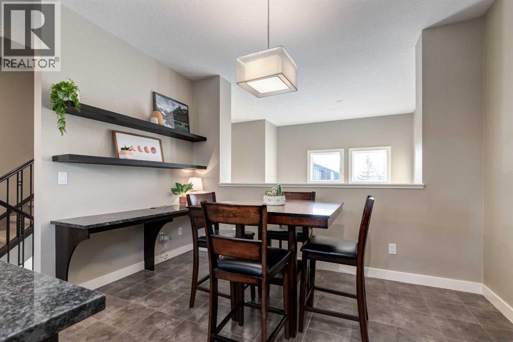 705 Evanston Square Nw, Calgary, AB - Indoor Photo Showing Dining Room