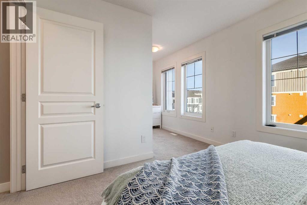 705 Evanston Square Nw, Calgary, AB - Indoor Photo Showing Bedroom