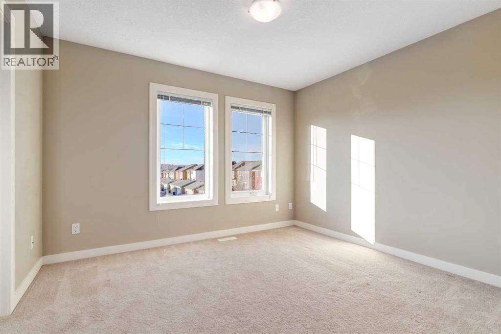 705 Evanston Square Nw, Calgary, AB - Indoor Photo Showing Other Room