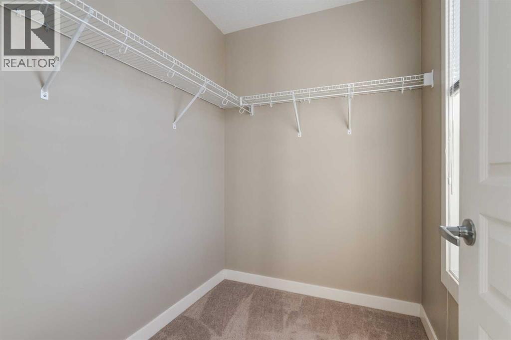 705 Evanston Square Nw, Calgary, AB - Indoor With Storage