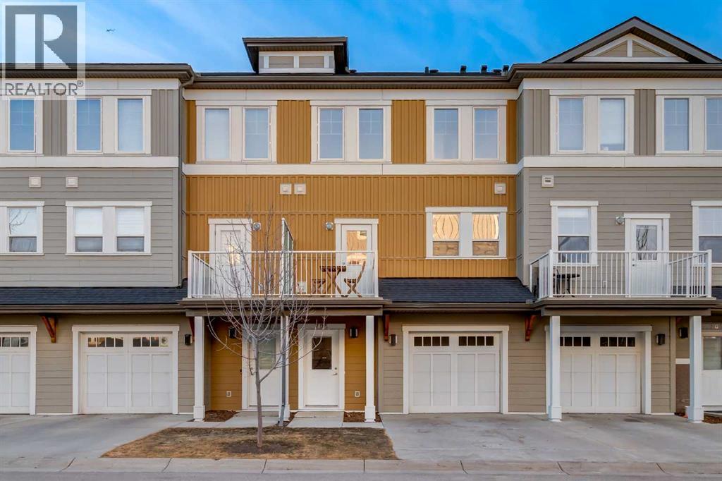 705 Evanston Square Nw, Calgary, AB - Outdoor With Balcony With Facade