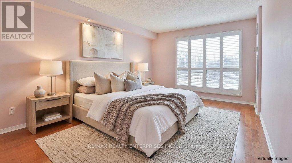 Primary bedroom staged - 211 - 1800 The Collegeway, Mississauga, ON - Indoor Photo Showing Bedroom