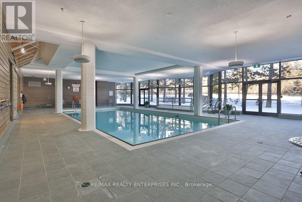 Saltwater Pool - 211 - 1800 The Collegeway, Mississauga, ON - Indoor Photo Showing Other Room With In Ground Pool