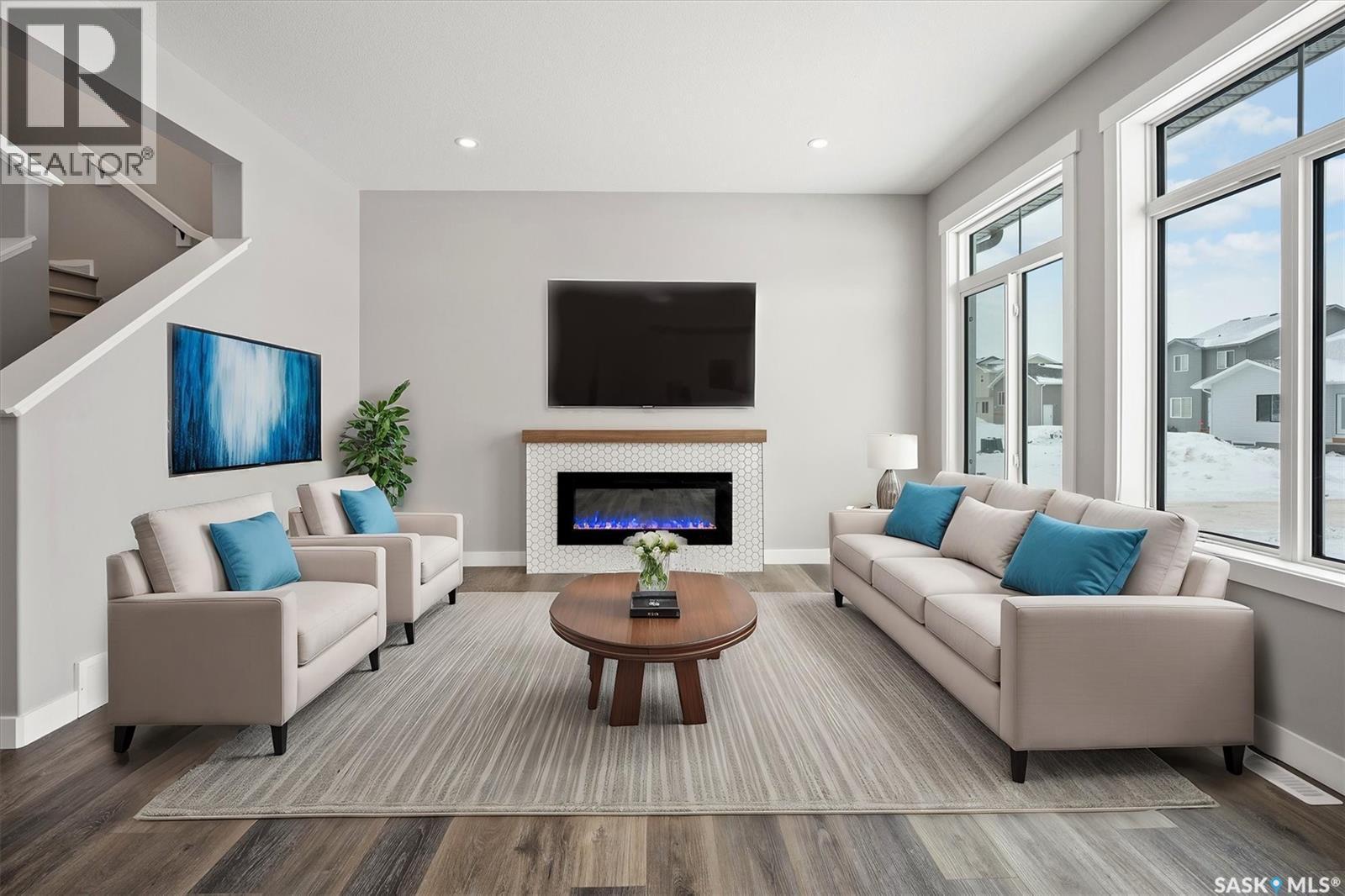 411 Yuel Crescent, Saskatoon, SK - Indoor Photo Showing Living Room With Fireplace