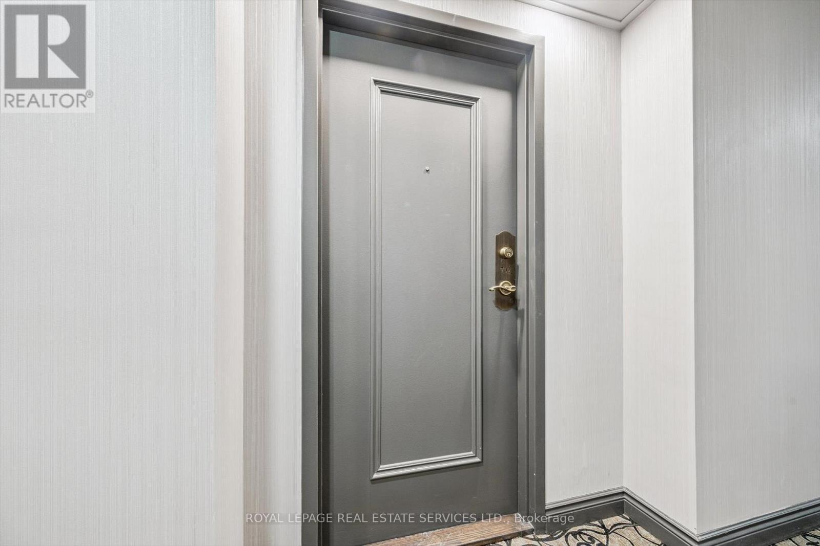 Entrance to Suite #702 - 702 - 1240 Marlborough Court, Oakville, ON - Photo Showing Other Room