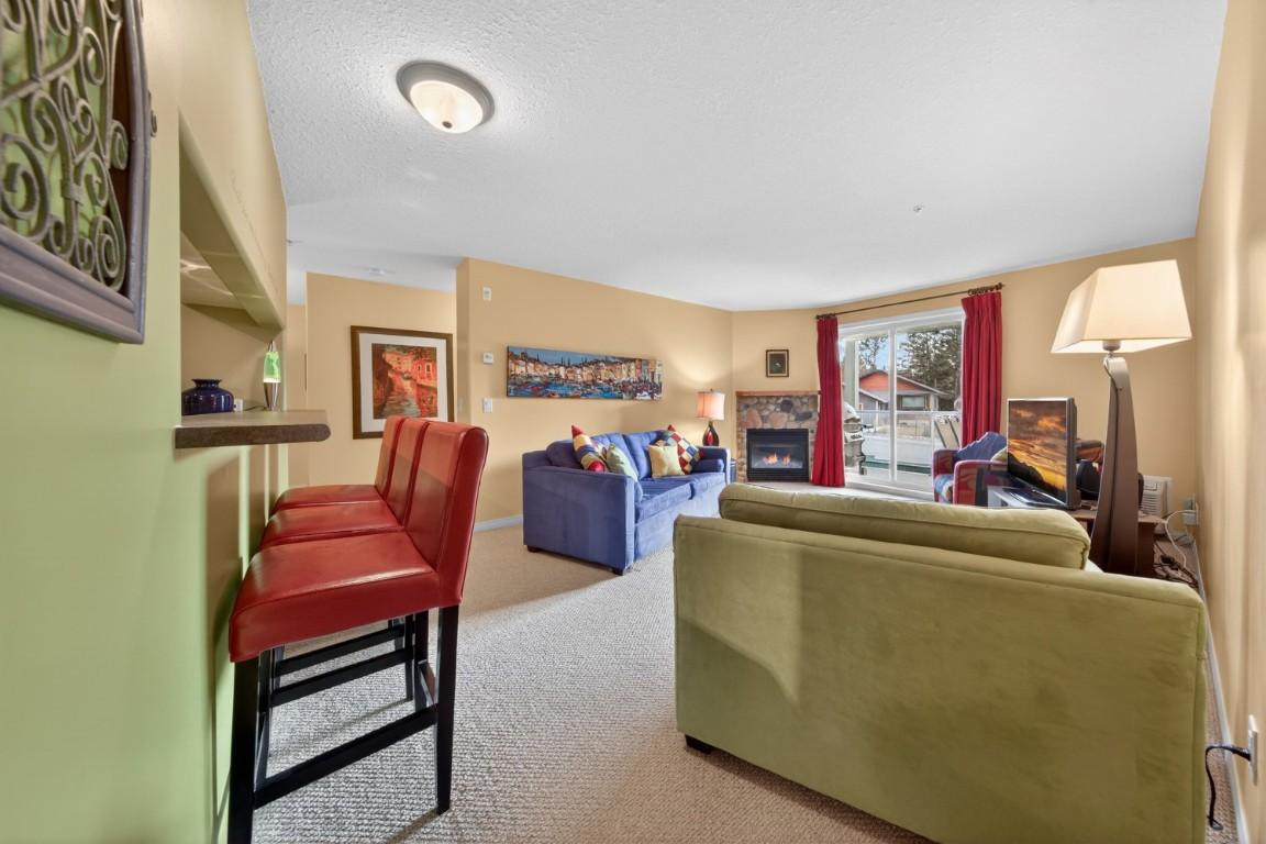 205-4767 Forsters Landing Road, Radium Hot Springs, BC - Indoor Photo Showing Other Room With Fireplace