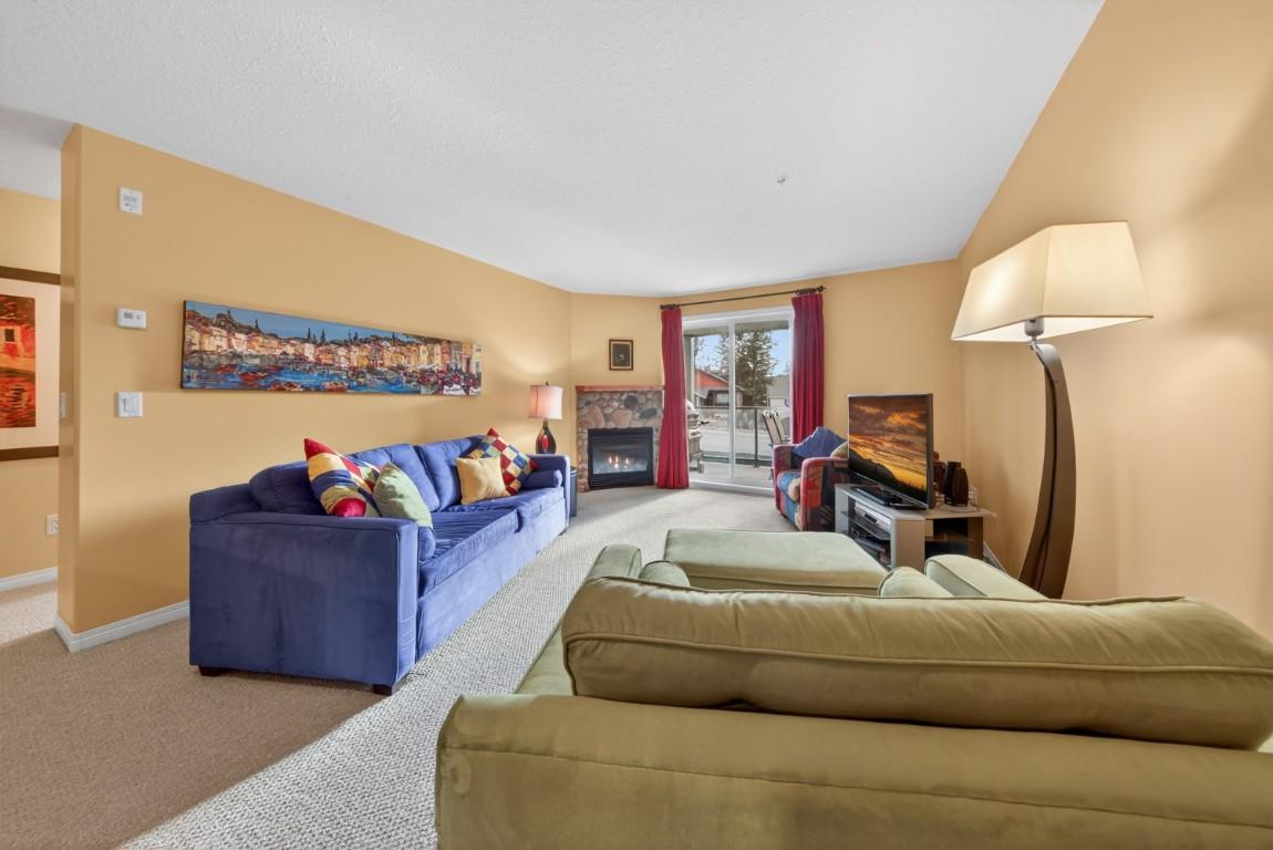 205-4767 Forsters Landing Road, Radium Hot Springs, BC - Indoor Photo Showing Living Room With Fireplace