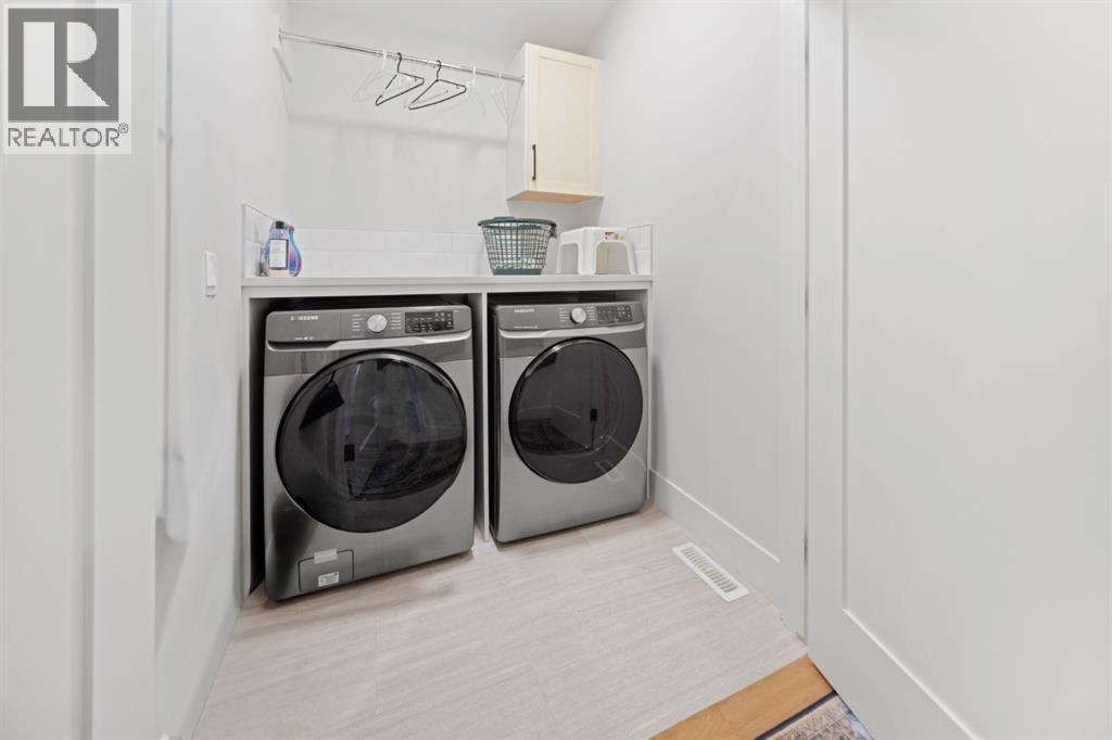 4, 810 3Rd Street, Canmore, AB - Indoor Photo Showing Laundry Room