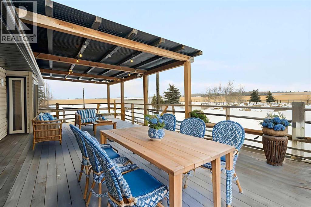 Disclaimer! This Photo is virtually staged - 284226 Township Road 254, Rural Rocky View County, AB - Outdoor With Deck Patio Veranda With Exterior