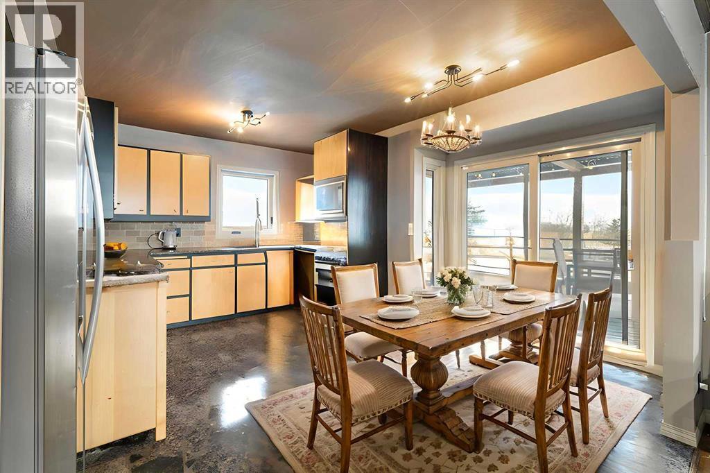 Disclaimer! This Photo is virtually staged - 284226 Township Road 254, Rural Rocky View County, AB - Indoor Photo Showing Dining Room