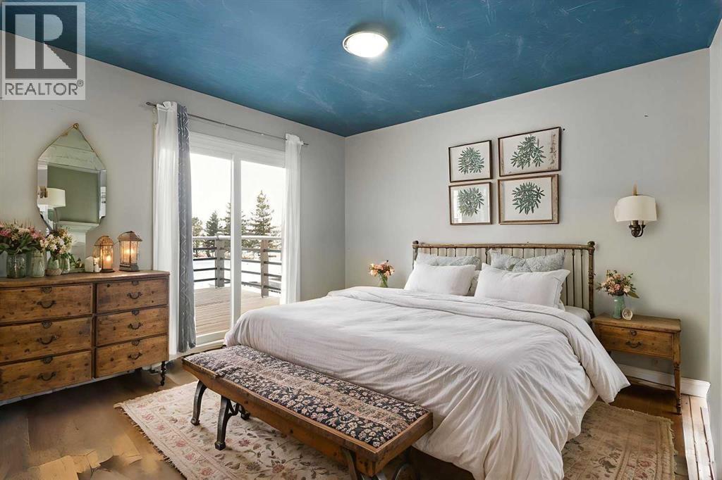 Disclaimer! This Photo is virtually staged. Main Floor- Master bedroom Style 1 - 284226 Township Road 254, Rural Rocky View County, AB - Indoor Photo Showing Bedroom