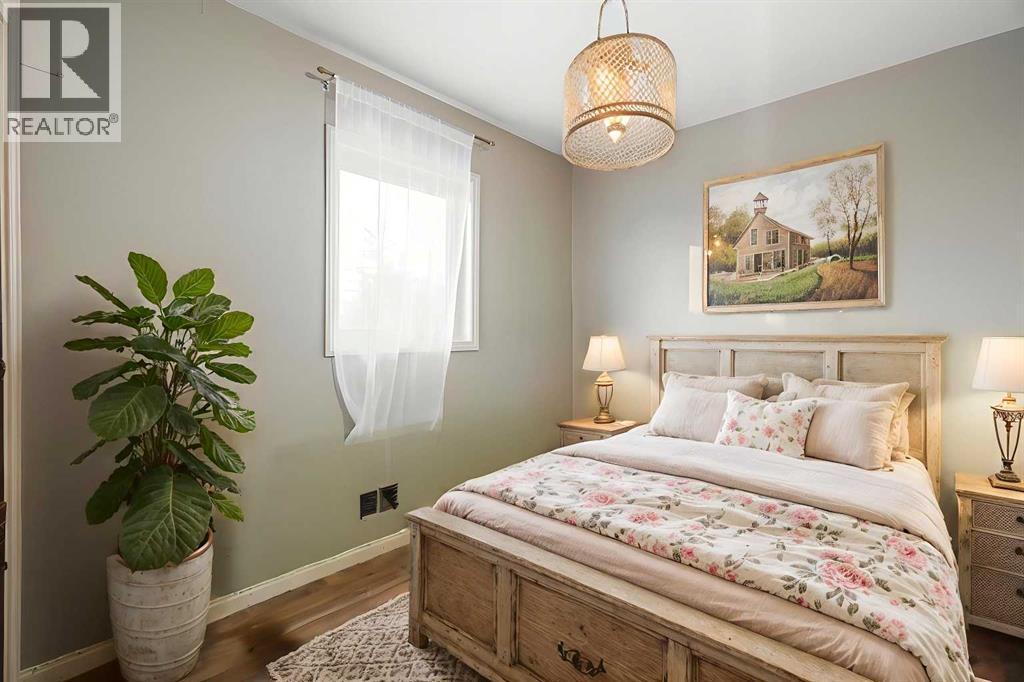 Disclaimer! This Photo is virtually staged - 284226 Township Road 254, Rural Rocky View County, AB - Indoor Photo Showing Bedroom