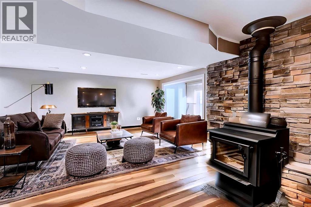 Disclaimer! This Photo is virtually staged. Main Floor - 284226 Township Road 254, Rural Rocky View County, AB - Indoor Photo Showing Living Room