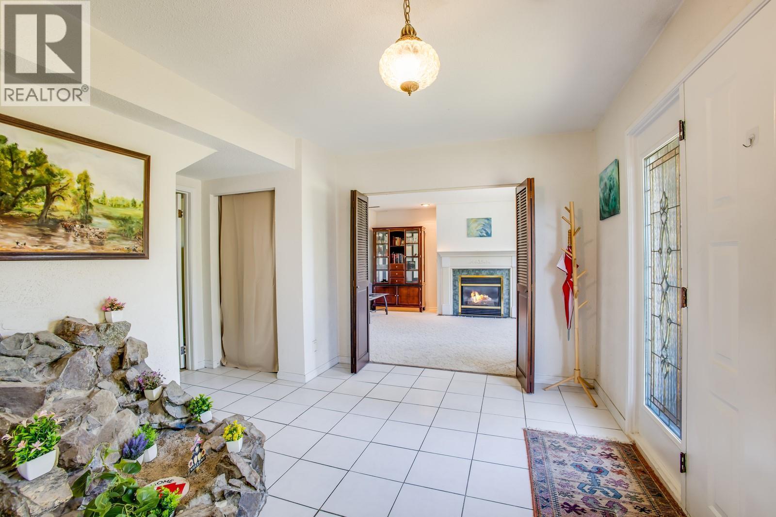 3088 Beverly Place, West Kelowna, BC - Indoor Photo Showing Other Room With Fireplace