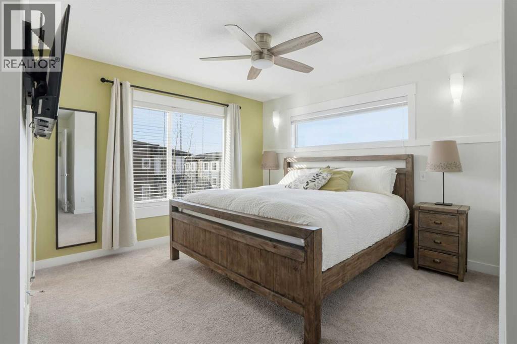 Primary suite - 70, 111 Rainbow Falls Gate, Chestermere, AB - Indoor Photo Showing Bedroom
