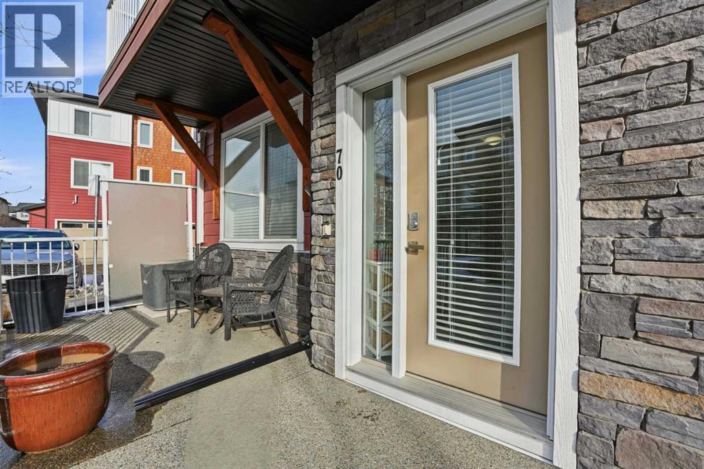 Patio - 70, 111 Rainbow Falls Gate, Chestermere, AB - Outdoor With Exterior