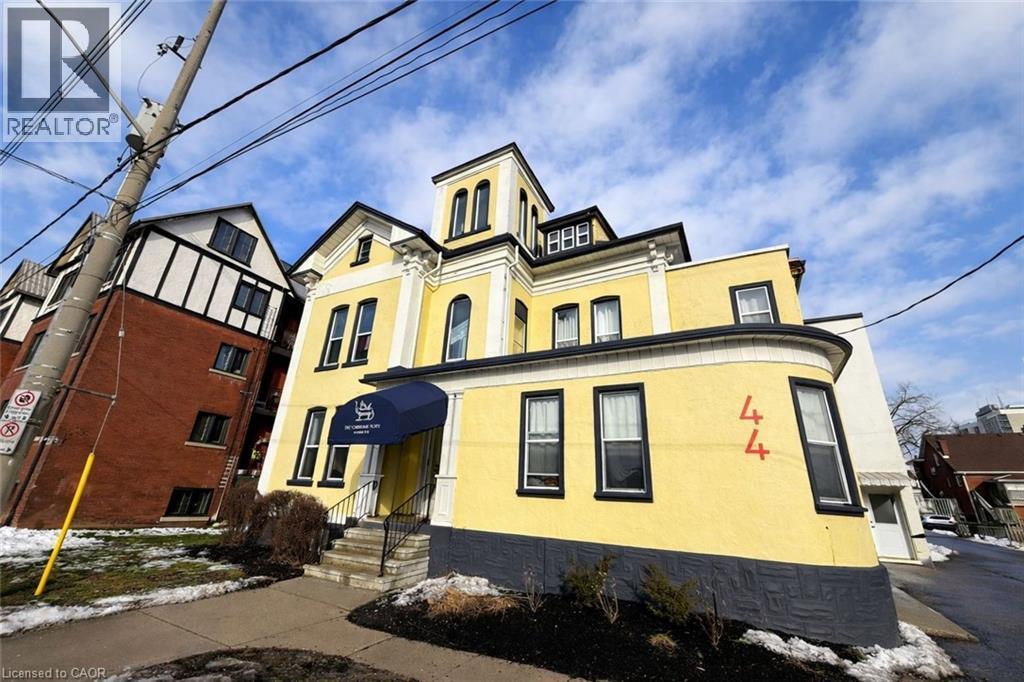 View of front of house featuring stucco siding - 44 Weber Street W, Kitchener, ON - Outdoor
