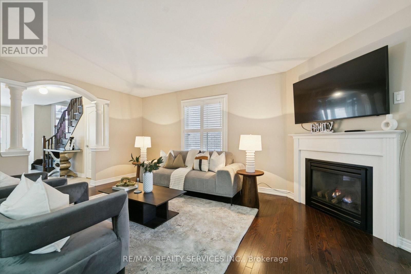 9 Beachville Circle, Brampton, ON - Indoor Photo Showing Living Room With Fireplace