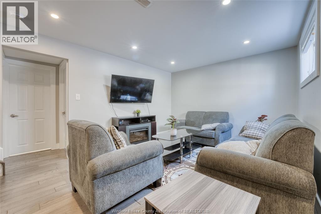 2901 Robillard Cresent, Windsor, ON - Indoor With Fireplace