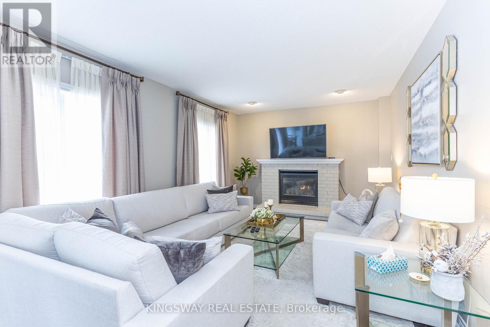 4175 Arbourfield Drive, Burlington, ON - Indoor Photo Showing Living Room With Fireplace