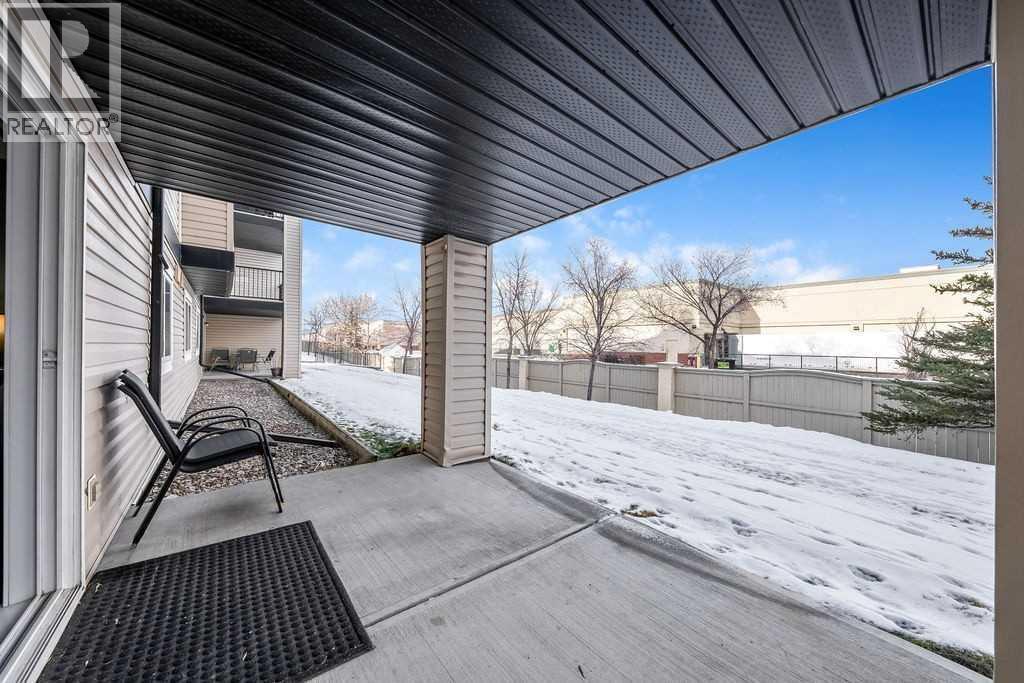 Patio Looking NW - 1120, 4975 130 Avenue Se, Calgary, AB - Outdoor With Exterior