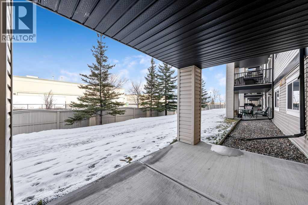 Patio Looking NE - 1120, 4975 130 Avenue Se, Calgary, AB - Outdoor With Exterior