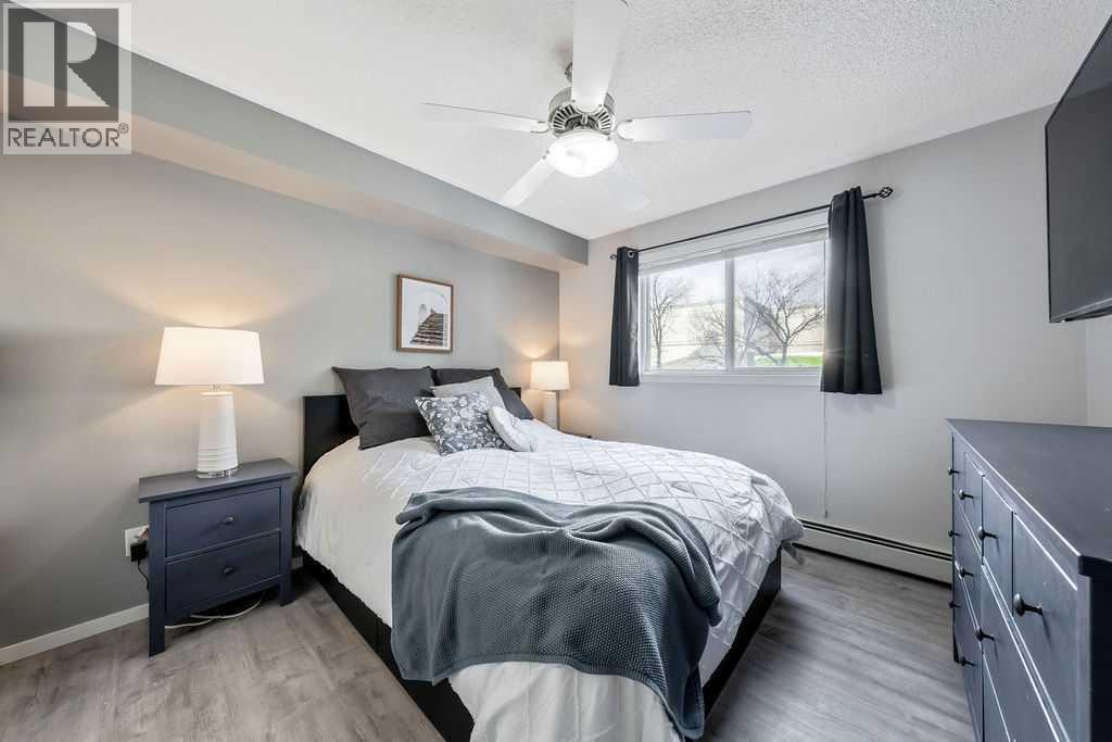 Primary Bedroom - 1120, 4975 130 Avenue Se, Calgary, AB - Indoor Photo Showing Bedroom