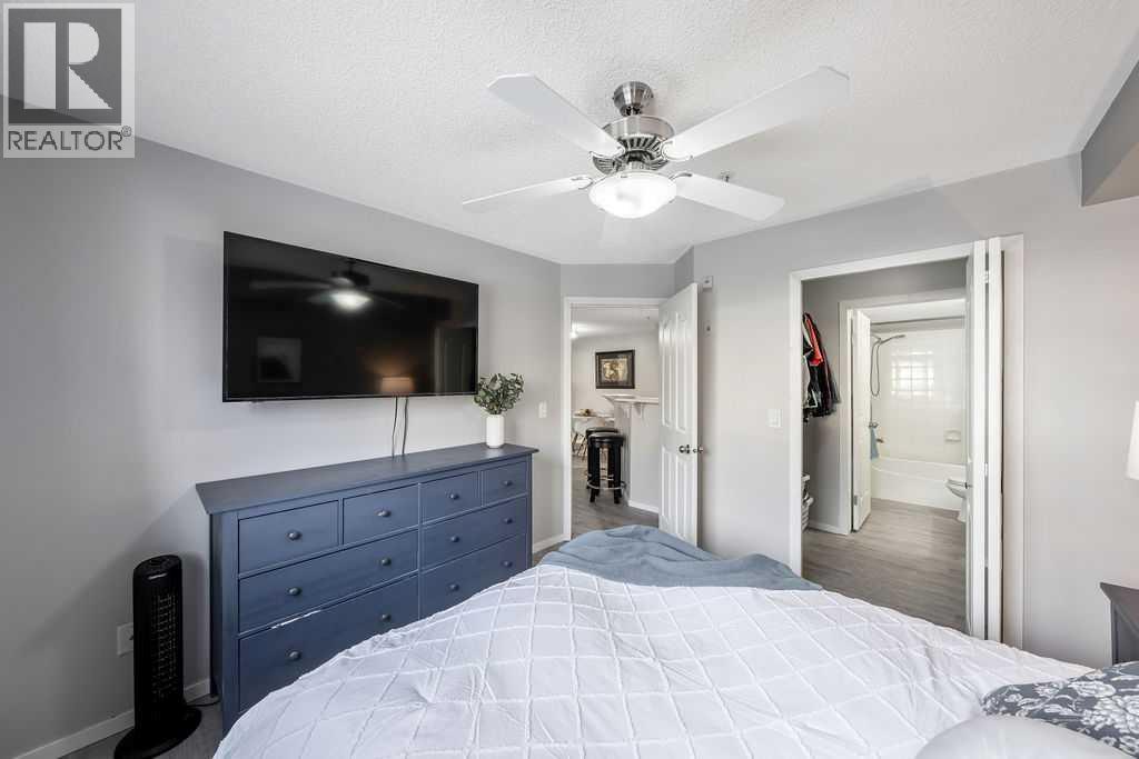 Primary bedroom - 1120, 4975 130 Avenue Se, Calgary, AB - Indoor Photo Showing Bedroom