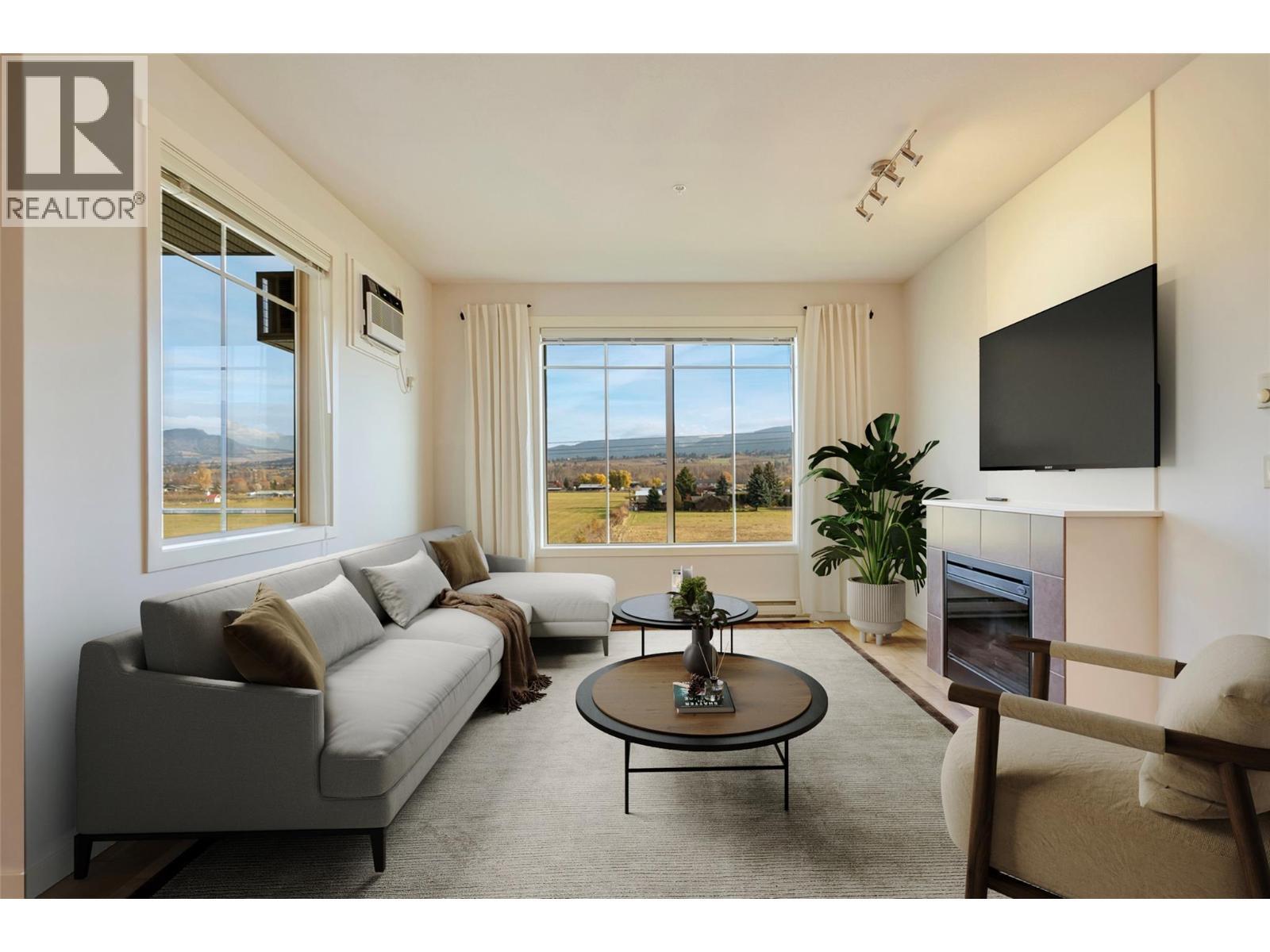 Virtually Staged - 3739 Casorso Road Unit# 313, Kelowna, BC - Indoor Photo Showing Living Room With Fireplace