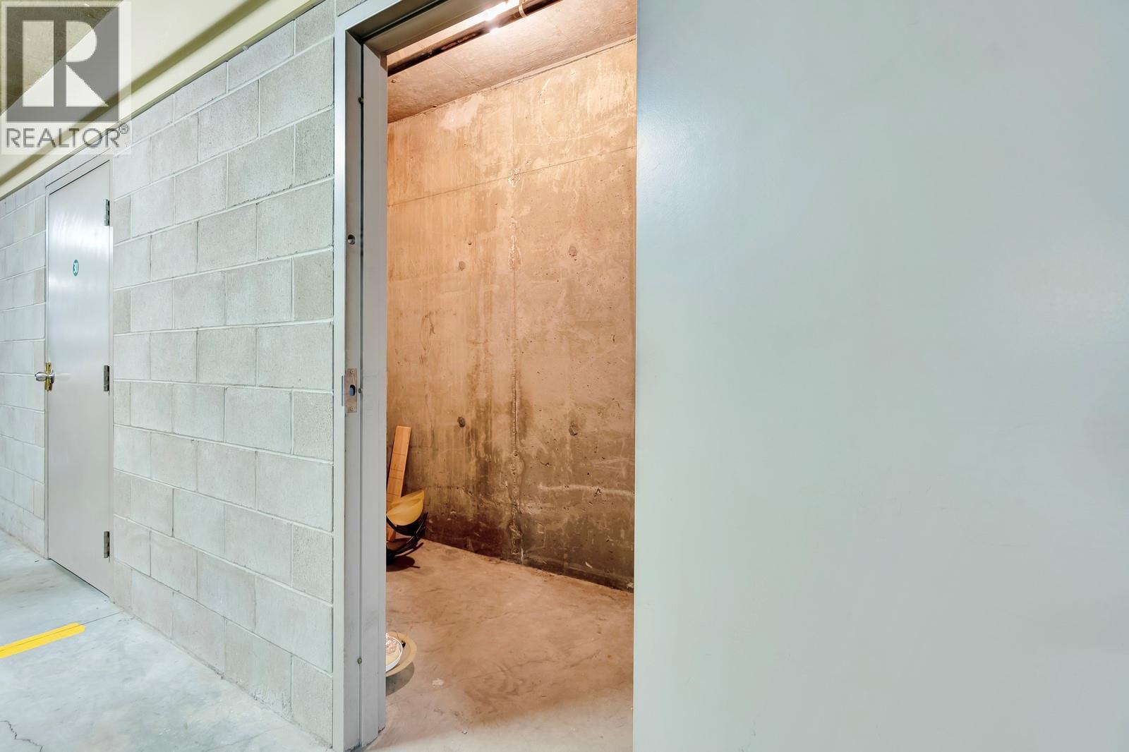 Secure Storage Unit Conveniently Positioned Behind The Parking Stall - 3739 Casorso Road Unit# 313, Kelowna, BC - Indoor