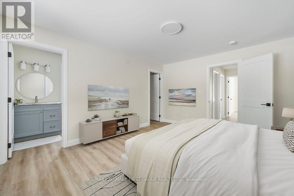 Primary Suite with Walk in Closet - 35 Crookston Road, Centre Hastings, ON - Indoor Photo Showing Bedroom