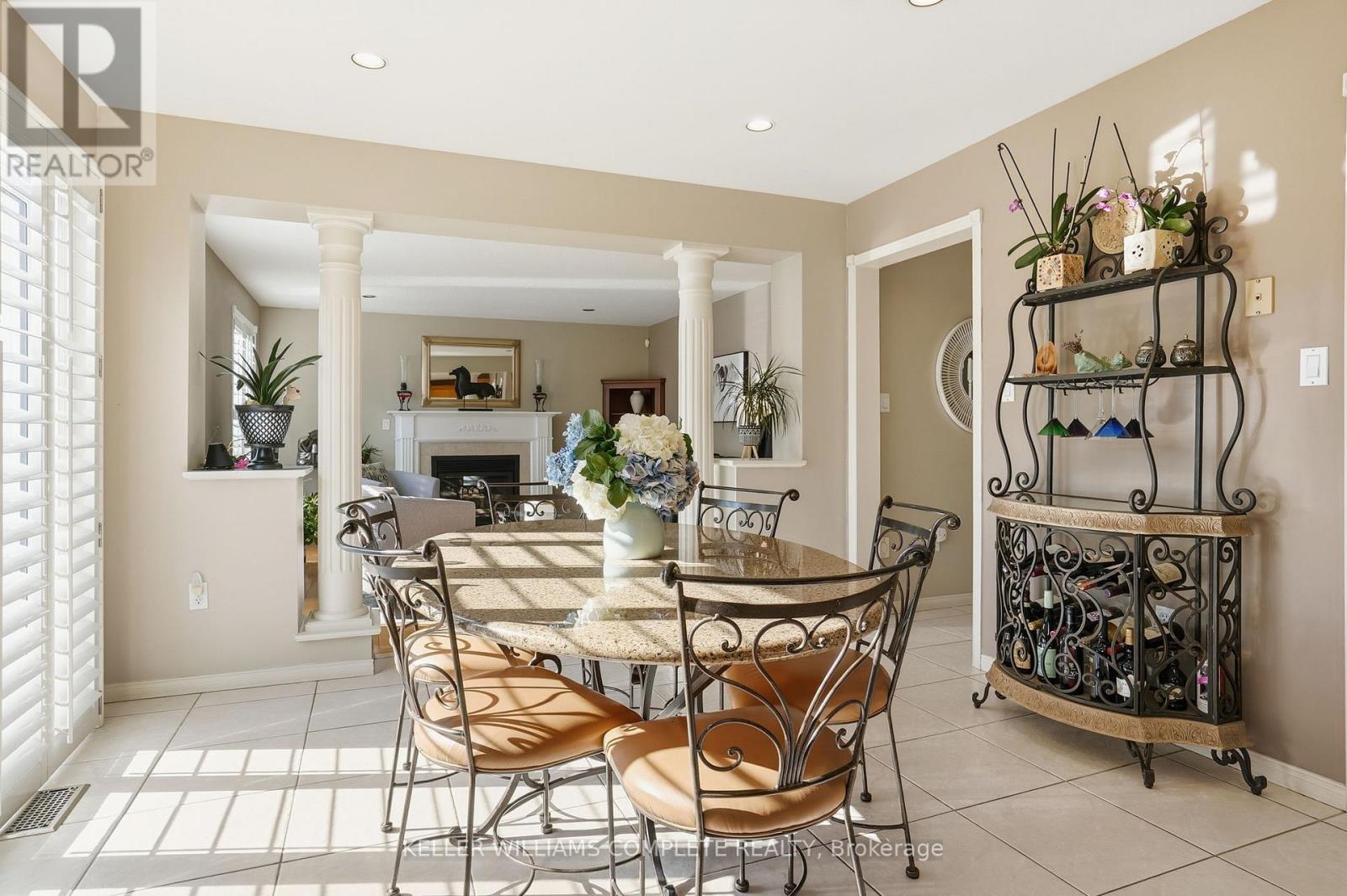 37 Southcreek Drive, Hamilton, ON - Indoor Photo Showing Dining Room With Fireplace