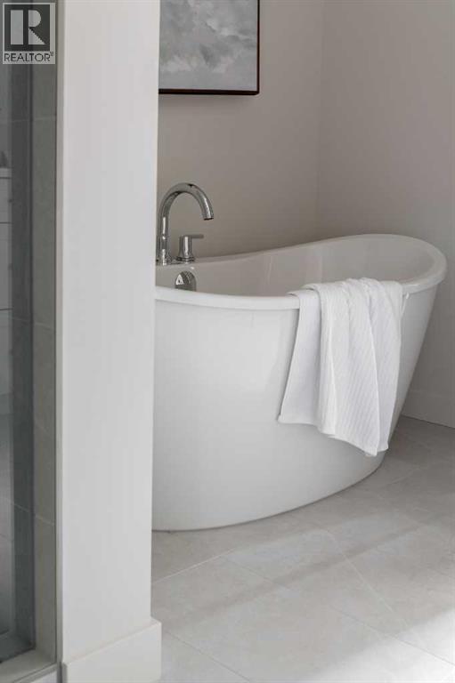 88 Sunrise Heath, Cochrane, AB - Indoor Photo Showing Bathroom