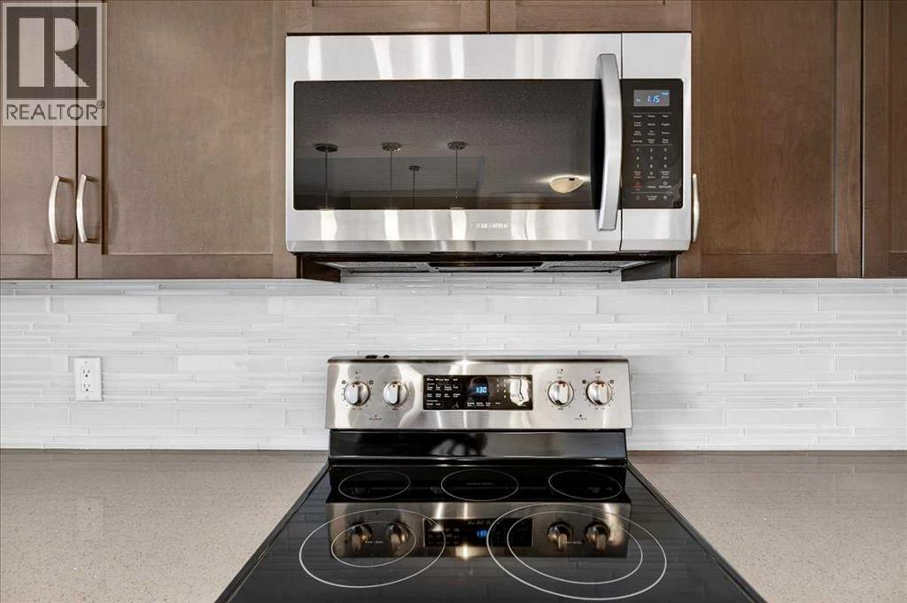 501, 24 Varsity Estates Circle Nw, Calgary, AB - Indoor Photo Showing Kitchen With Upgraded Kitchen