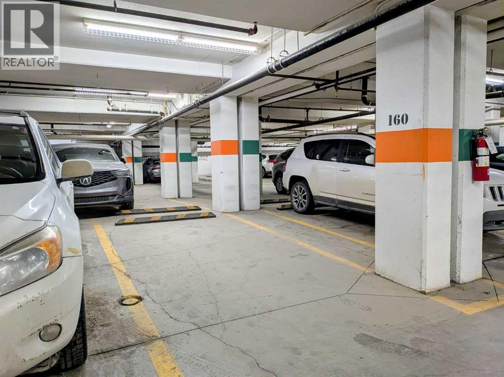 501, 24 Varsity Estates Circle Nw, Calgary, AB - Indoor Photo Showing Garage