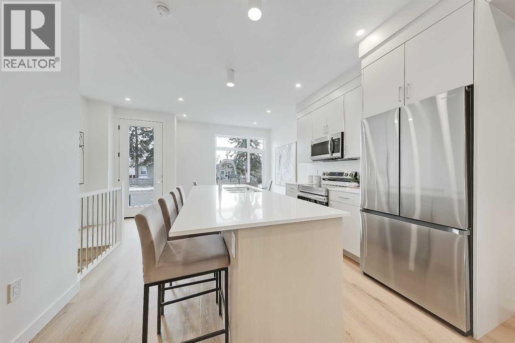 109 & 102, 3550 45 Street Sw, Calgary, AB - Indoor Photo Showing Kitchen With Stainless Steel Kitchen With Upgraded Kitchen