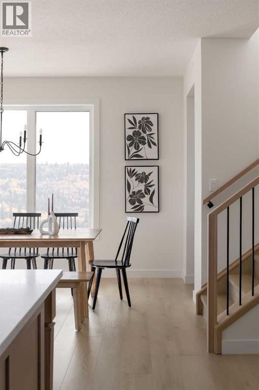28 Sunvalley View, Cochrane, AB - Indoor Photo Showing Dining Room