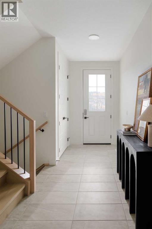 28 Sunvalley View, Cochrane, AB - Indoor Photo Showing Other Room