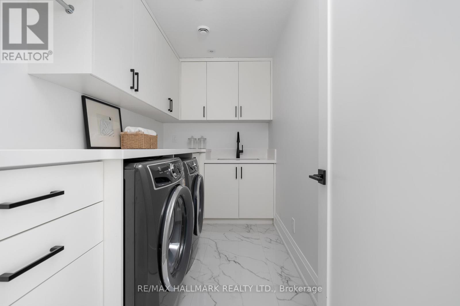 36 Karnwood Drive, Toronto, ON - Indoor Photo Showing Laundry Room