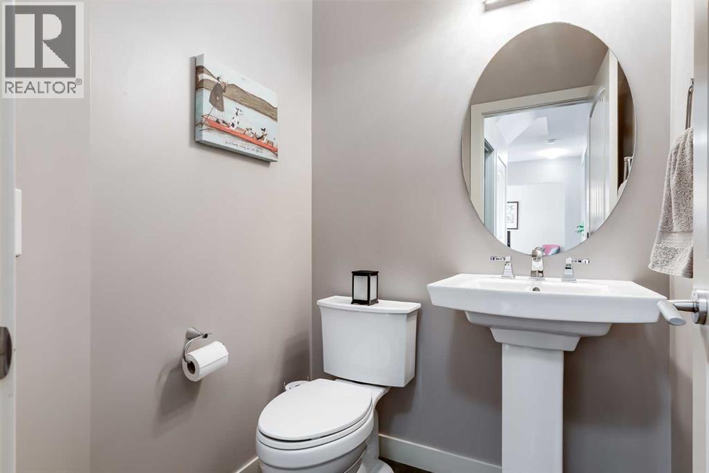 Main Half Bathroom - 382 Williamstown Green Nw, Airdrie, AB - Indoor Photo Showing Bathroom