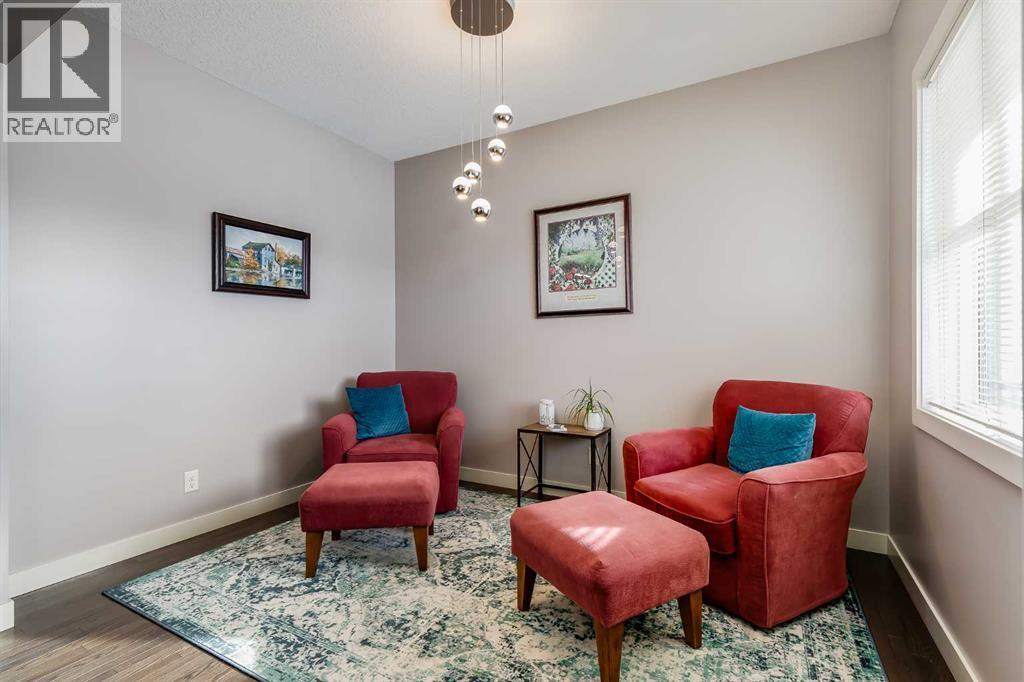 Front Flex Room - 382 Williamstown Green Nw, Airdrie, AB - Indoor Photo Showing Living Room