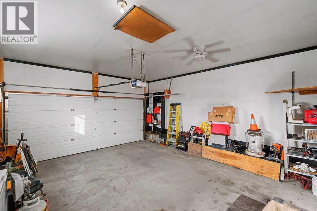 272 Chaparral Drive Se, Calgary, AB - Indoor Photo Showing Garage