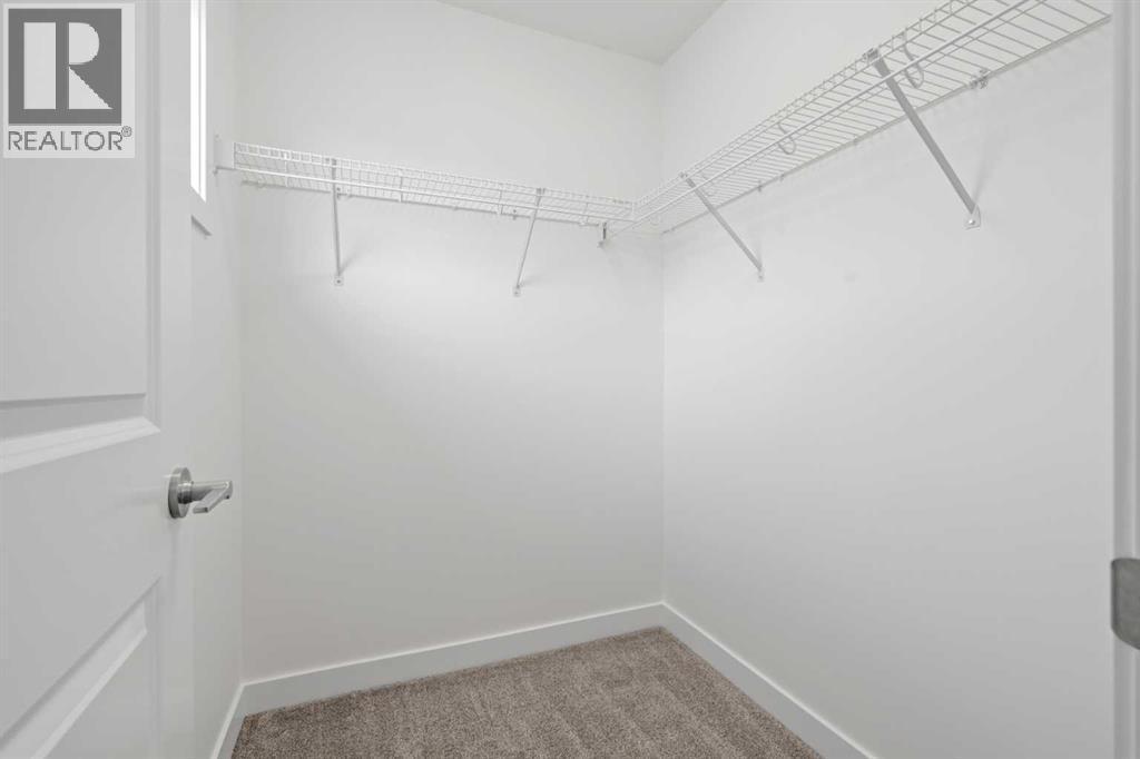 1506, 25 Wildwoods Court Sw, Airdrie, AB - Indoor With Storage