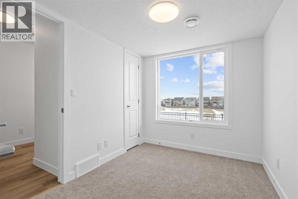 1506, 25 Wildwoods Court Sw, Airdrie, AB - Indoor Photo Showing Other Room