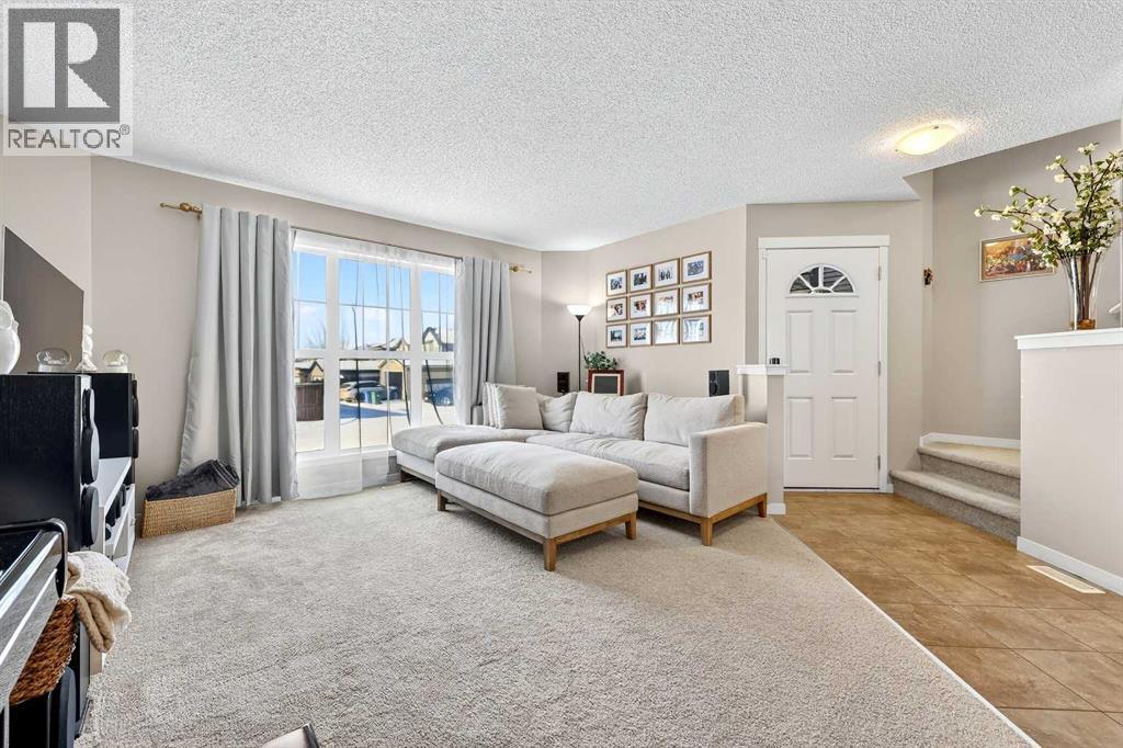 336 Cranberry Circle Se, Calgary, AB - Indoor Photo Showing Living Room