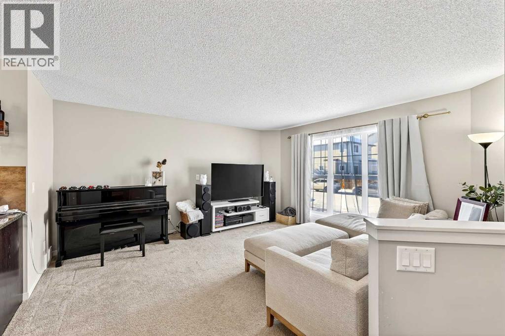 336 Cranberry Circle Se, Calgary, AB - Indoor Photo Showing Living Room