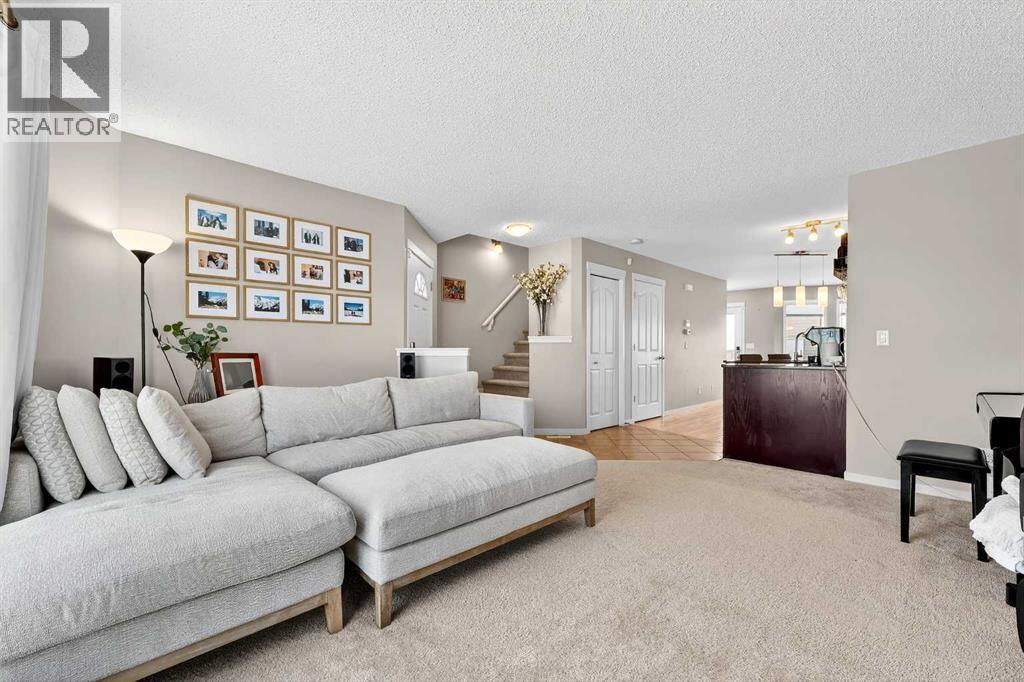 336 Cranberry Circle Se, Calgary, AB - Indoor Photo Showing Living Room