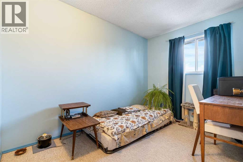 Bedroom - 6 Castleglen Road Ne, Calgary, AB - Indoor Photo Showing Bedroom